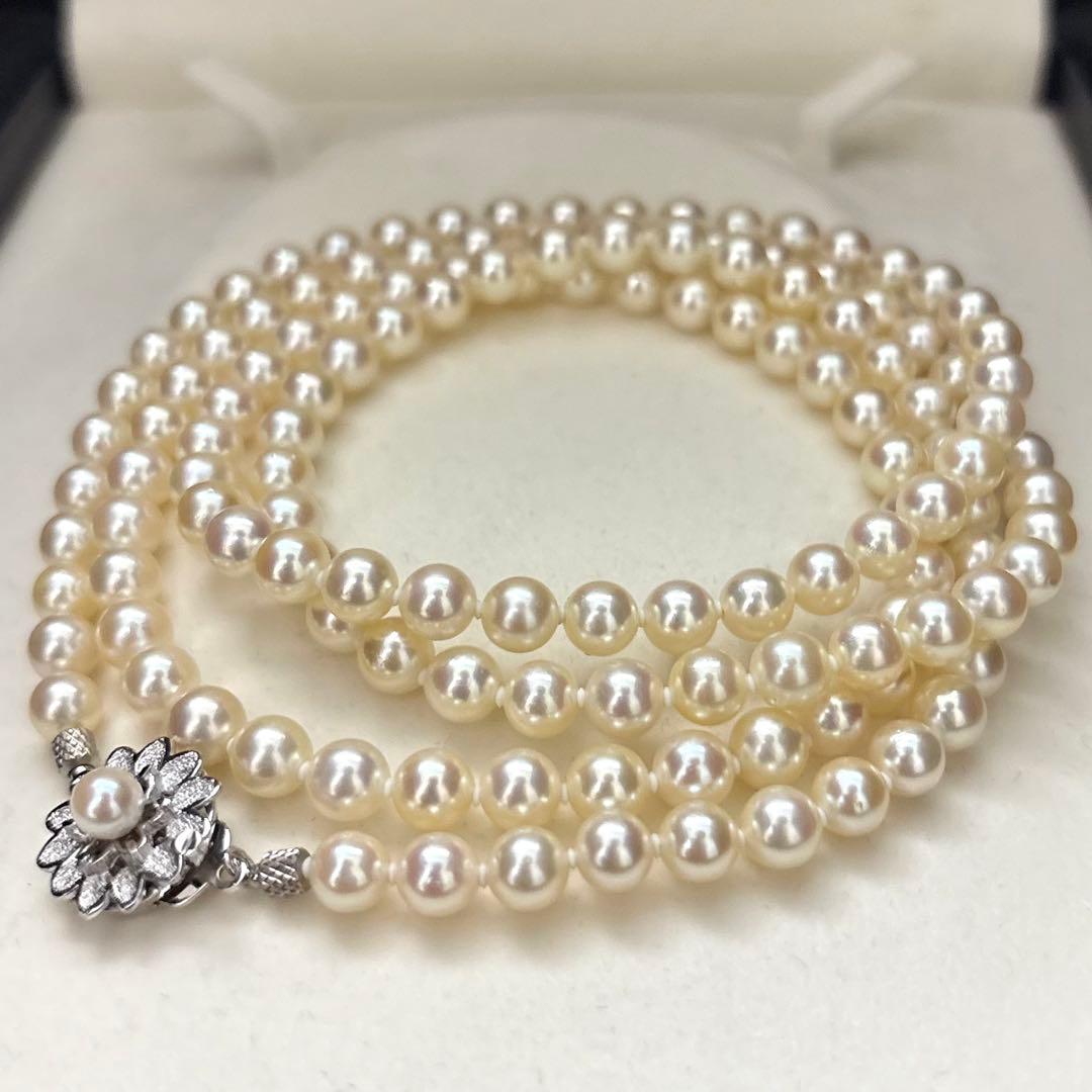 LongAkoya 96cm 2 strand necklace featuring 6.5mm round white Akoya pearls with silver marking