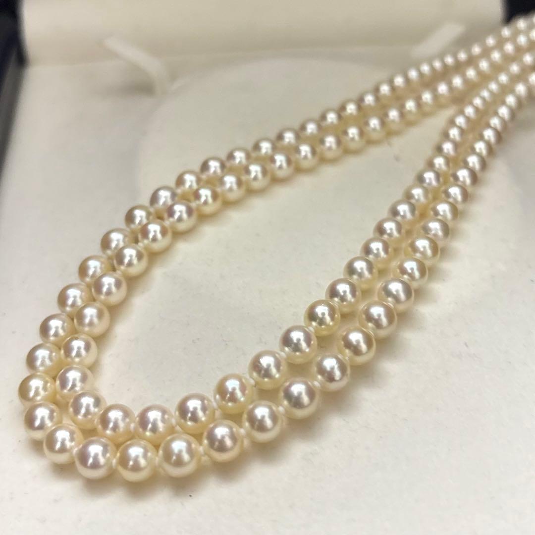 LongAkoya 96cm 2 strand necklace featuring 6.5mm round white Akoya pearls with silver marking