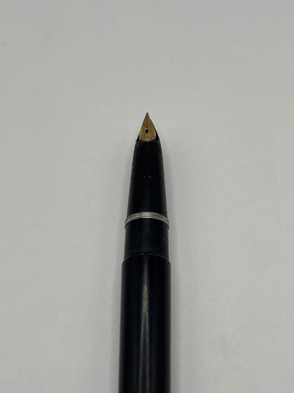 Pilot fountain pen with 14K inset nib, black barrel, and silver cap