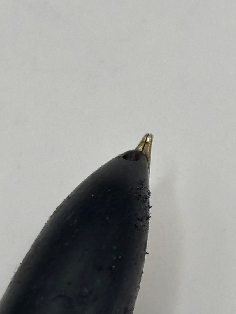 Pilot fountain pen with 14K inset nib, black barrel, and silver cap