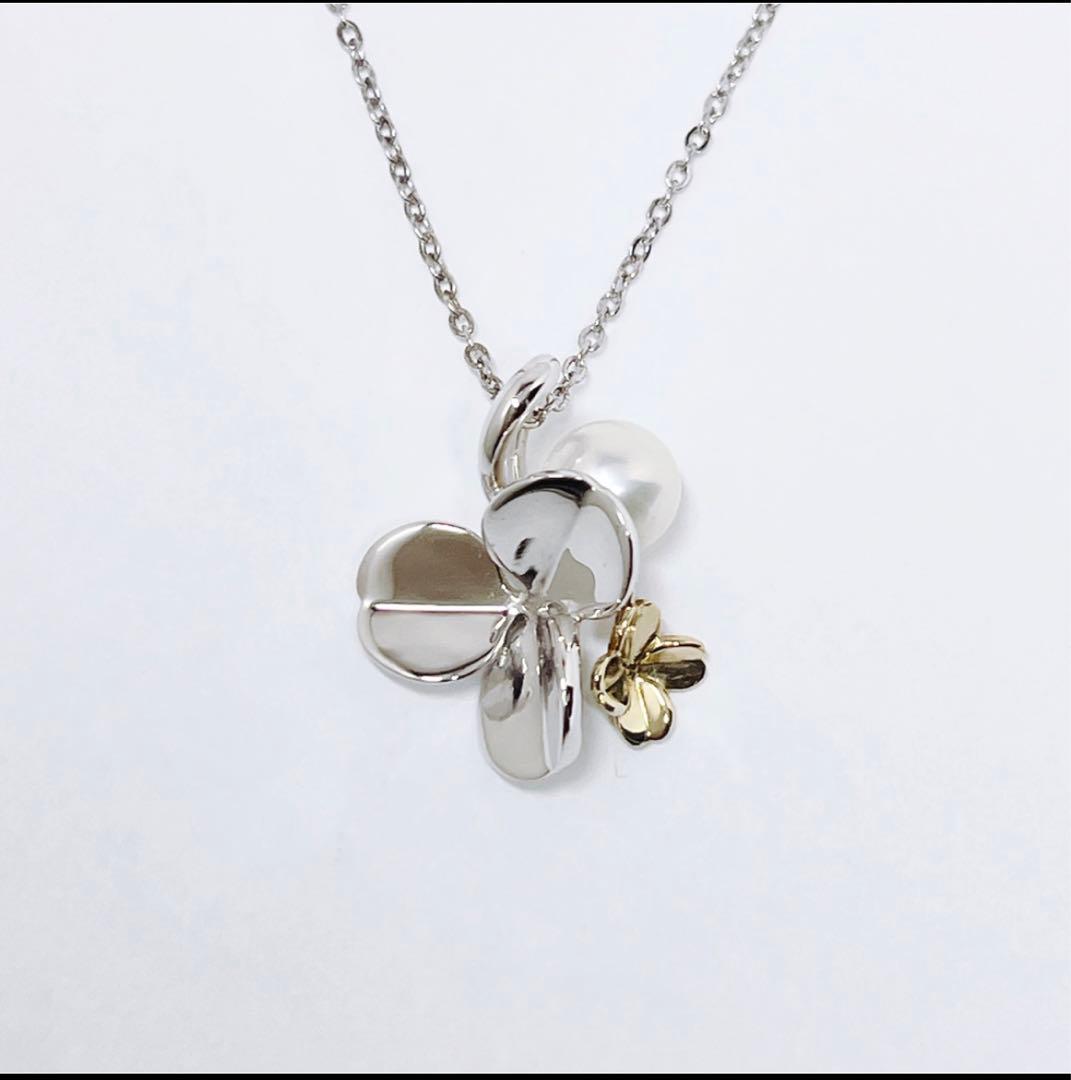 Mikimoto silver necklace with a 6.9mm pearl and four-leaf clover pendant on a 44.5cm chain