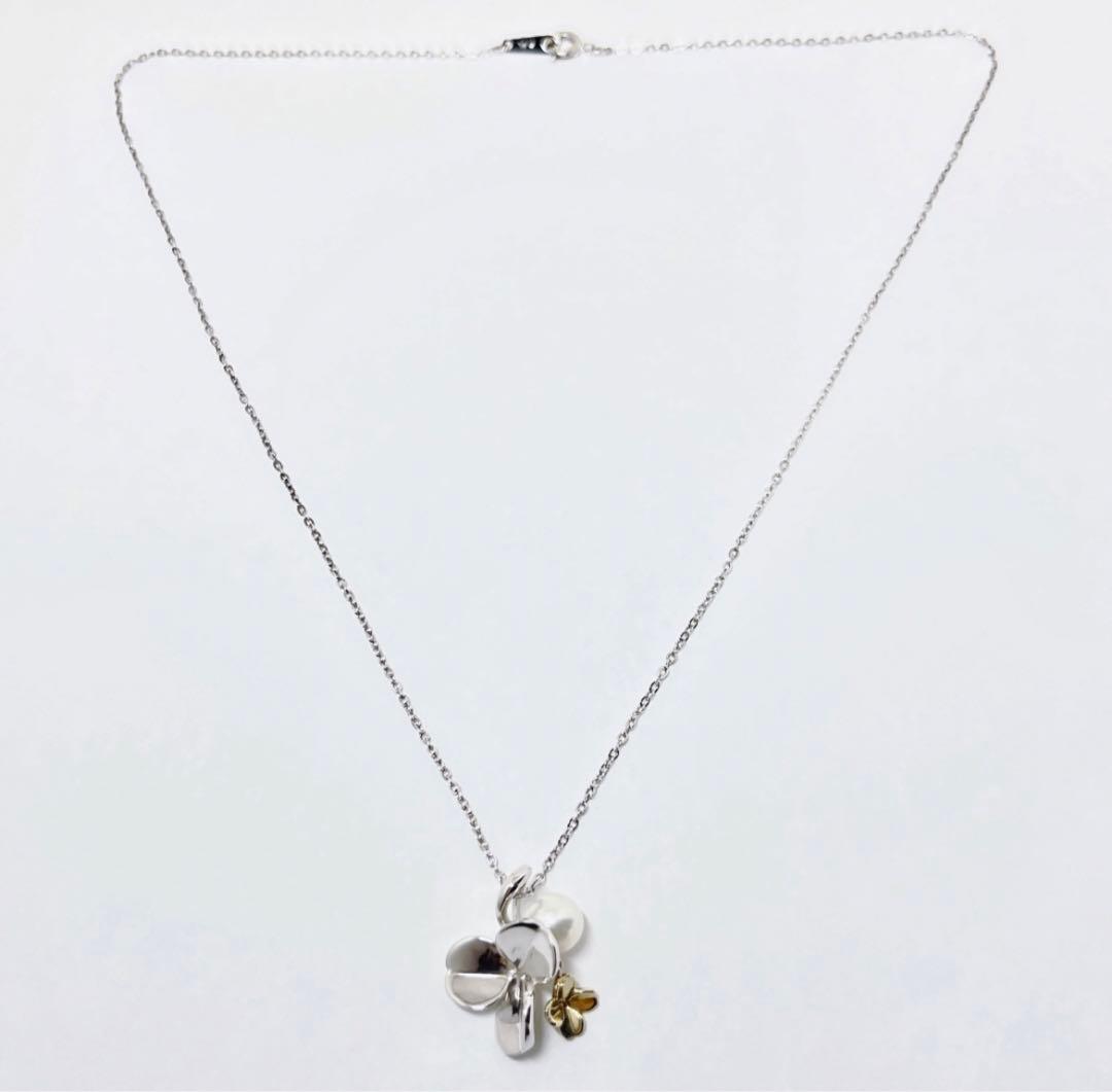 Mikimoto silver necklace with a 6.9mm pearl and four-leaf clover pendant on a 44.5cm chain