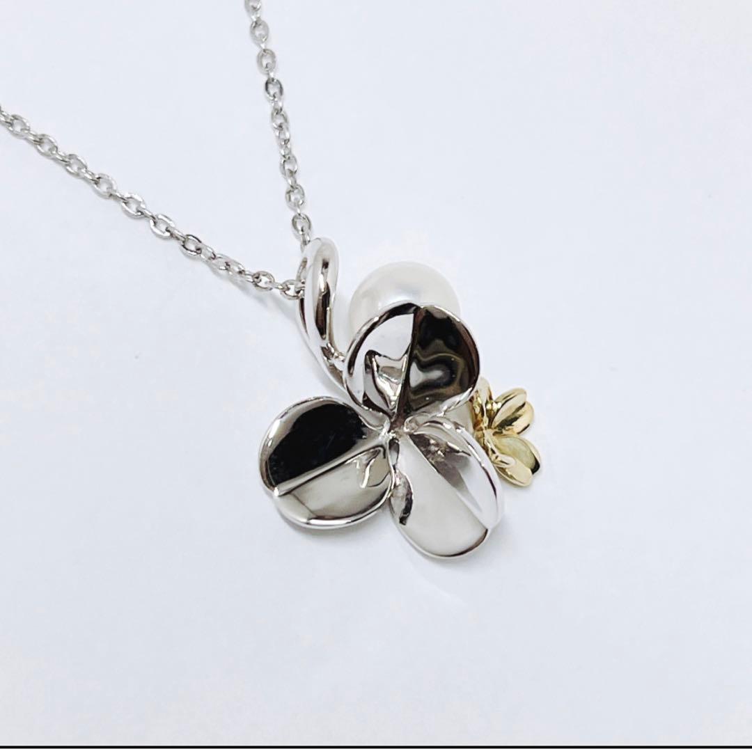 Mikimoto silver necklace with a 6.9mm pearl and four-leaf clover pendant on a 44.5cm chain