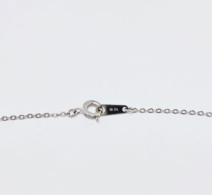 Mikimoto silver necklace with a 6.9mm pearl and four-leaf clover pendant on a 44.5cm chain