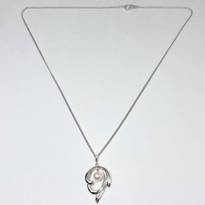 MIKIMOTO pearl necklace pendant with 6.1mm pearl on a 43cm silver chain