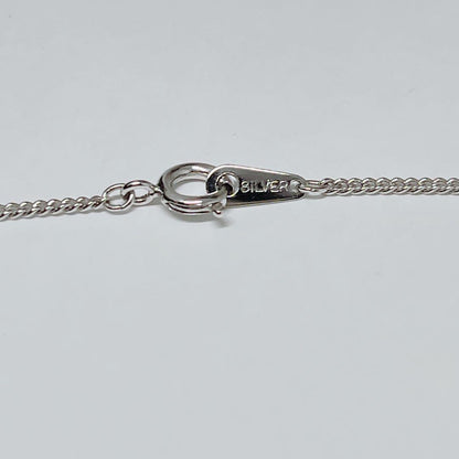 MIKIMOTO pearl necklace pendant with 6.1mm pearl on a 43cm silver chain
