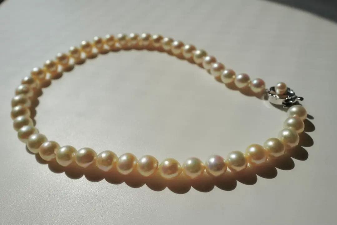 Akoya pearl genuine pearl necklace with deformed large beads 10.8-8.5mm in ivory pink and green hues, 43.3cm silver fittings