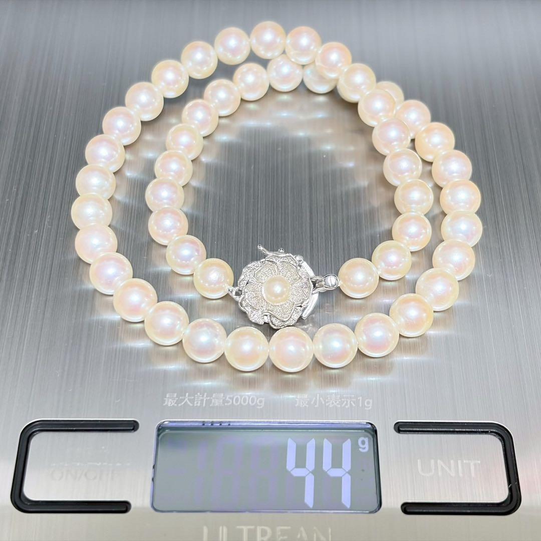 Honka Pearl Akoya necklace with 8.0-8.5mm white pearls and silver clasp on a white background