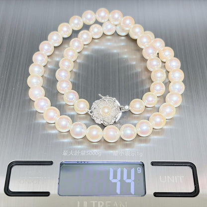 Honka Pearl Akoya necklace with 8.0-8.5mm white pearls and silver clasp on a white background