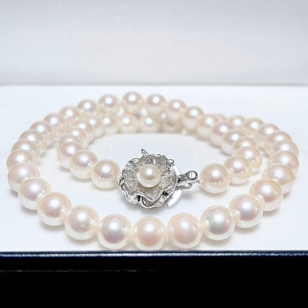 Honka Pearl Akoya necklace with 8.0-8.5mm white pearls and silver clasp on a white background
