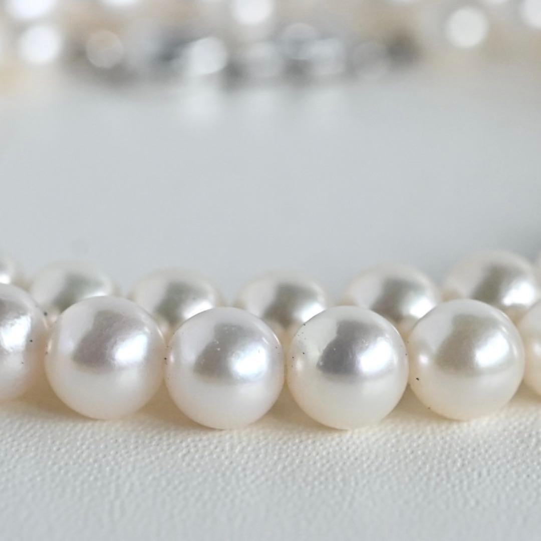 Aurora Hanadama Mikimoto Akoya pearl necklace with round pearls 7.5-5.0 mm and silver clasp on 40 cm string