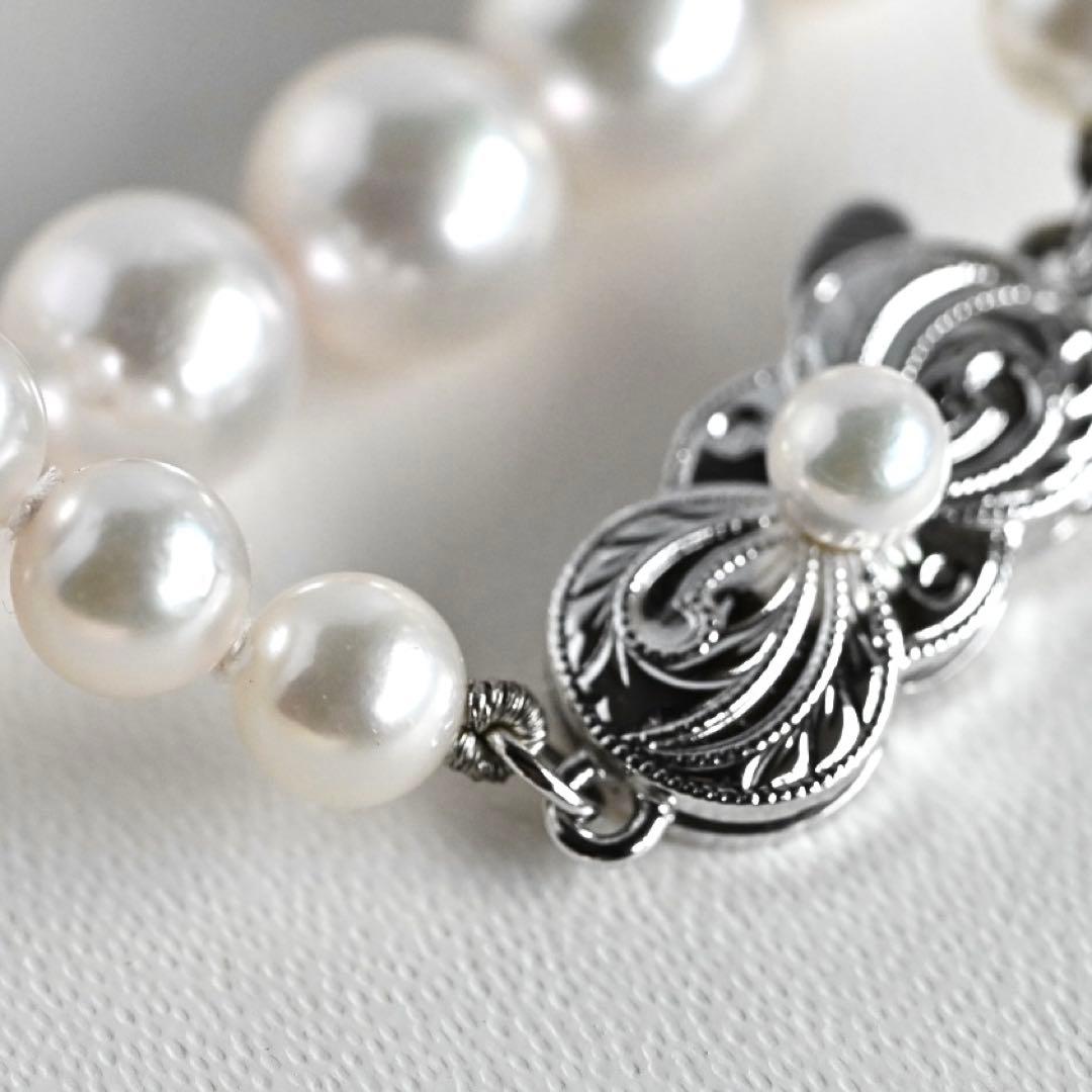 Aurora Hanadama Mikimoto Akoya pearl necklace with round pearls 7.5-5.0 mm and silver clasp on 40 cm string