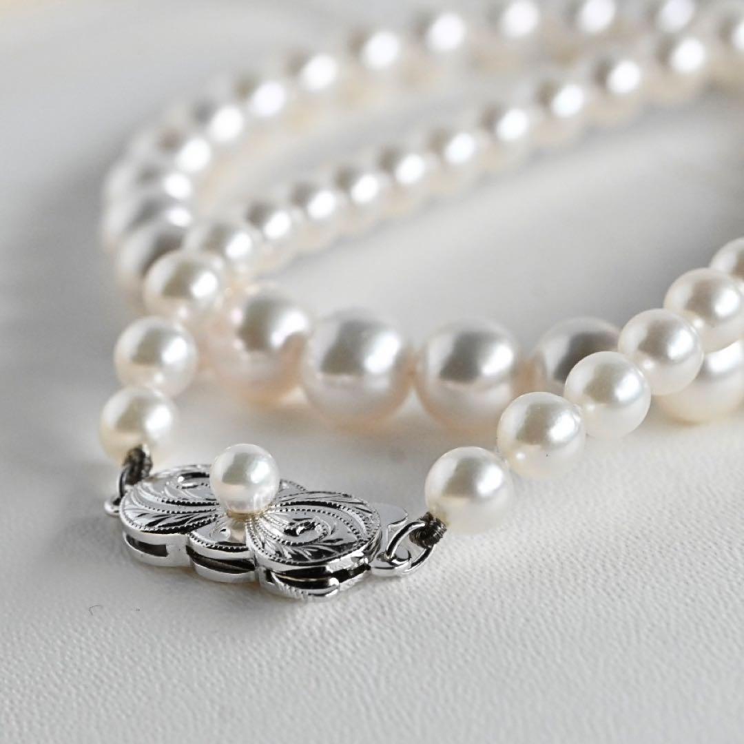 Aurora Hanadama Mikimoto Akoya pearl necklace with round pearls 7.5-5.0 mm and silver clasp on 40 cm string