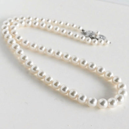 Aurora Hanadama Mikimoto Akoya pearl necklace with round pearls 7.5-5.0 mm and silver clasp on 40 cm string
