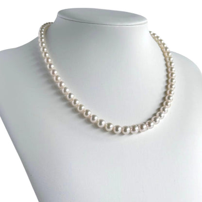 Aurora Hanadama Mikimoto Akoya pearl necklace with round pearls 7.5-5.0 mm and silver clasp on 40 cm string