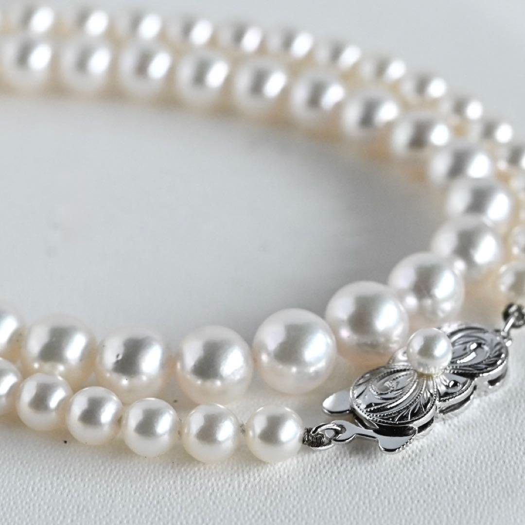 Aurora Hanadama Mikimoto Akoya pearl necklace with round pearls 7.5-5.0 mm and silver clasp on 40 cm string
