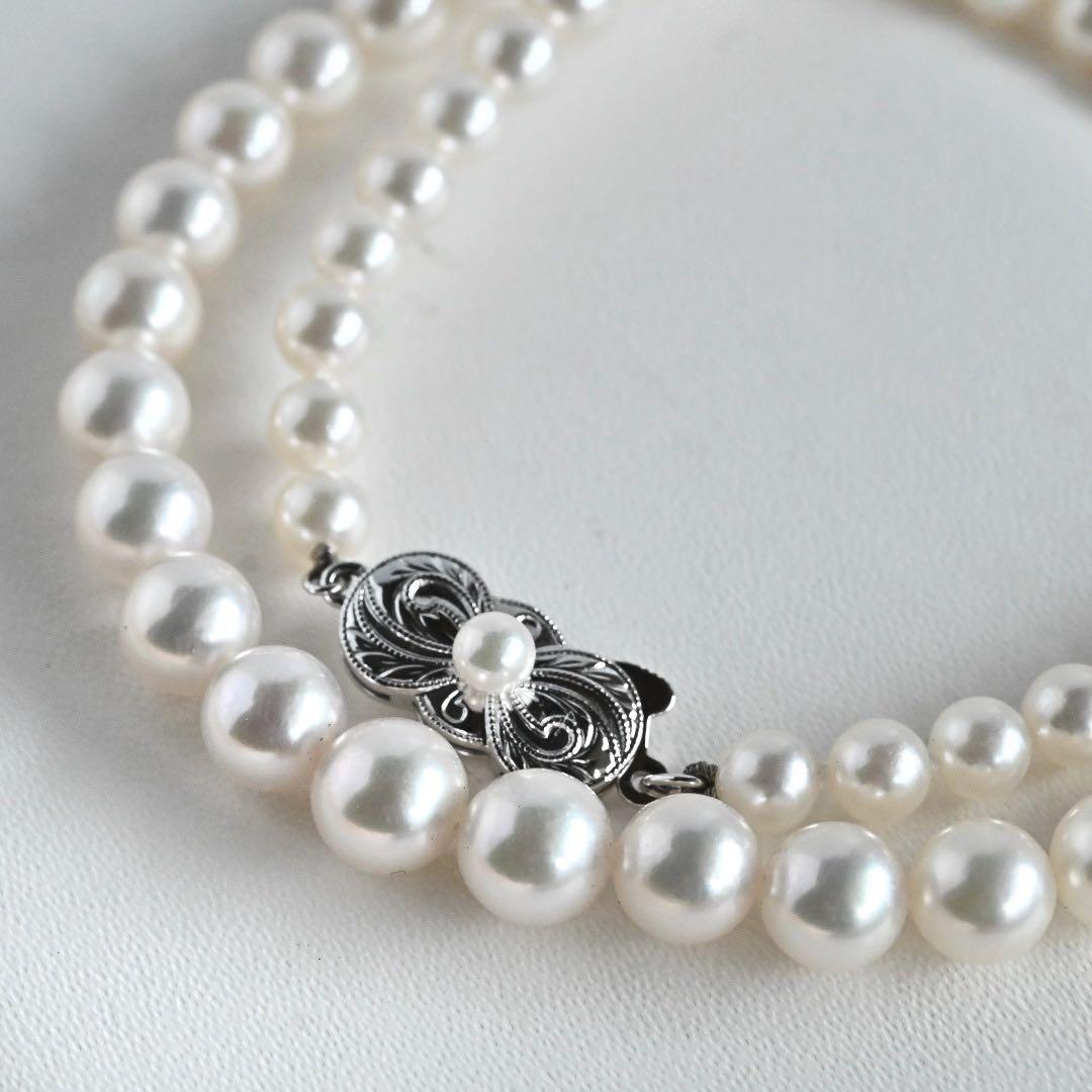 Aurora Hanadama Mikimoto Akoya pearl necklace with round pearls 7.5-5.0 mm and silver clasp on 40 cm string