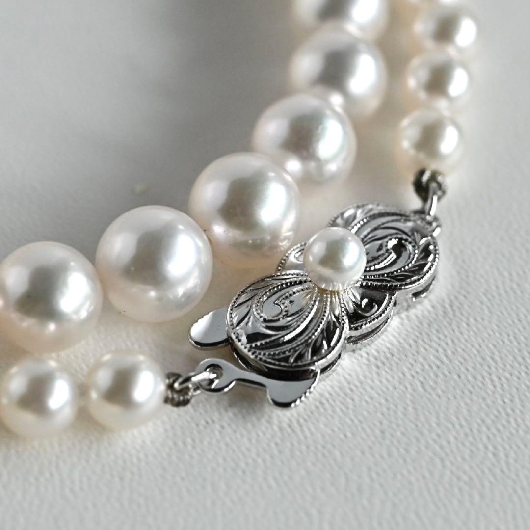 Aurora Hanadama Mikimoto Akoya pearl necklace with round pearls 7.5-5.0 mm and silver clasp on 40 cm string