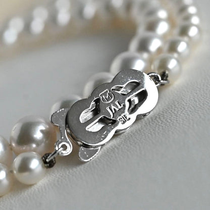 Aurora Hanadama Mikimoto Akoya pearl necklace with round pearls 7.5-5.0 mm and silver clasp on 40 cm string
