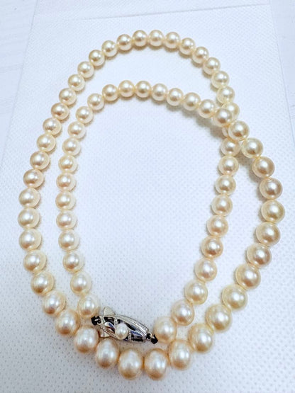 Mikimoto Akoya pearl necklace with 7.5mm pearls and 14K white gold WGK14 clasp, 55.5cm length