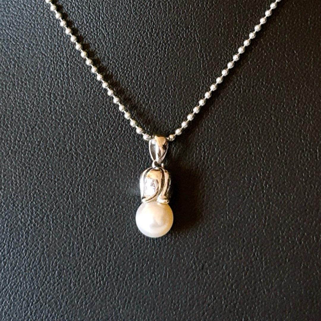TASAKI pearl necklace featuring 7.4mm diameter pearls on a 42cm chain