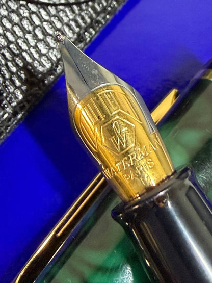 Waterman Phileas fountain pen in green marble with medium stainless steel nib and gold and silver bicolor finish