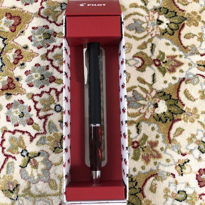 Pilot ballpoint pen with black and red two-tone plastic and metal body in dedicated box