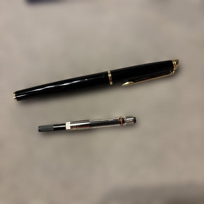 Used WATERMAN fountain pen with fine tip and converter showing minor scratches