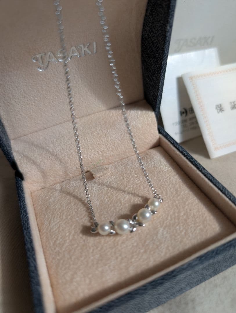 Tasaki Baby Pearl Silver Necklace with white baby pearls, adjustable 200mm length, displayed with certificate and box