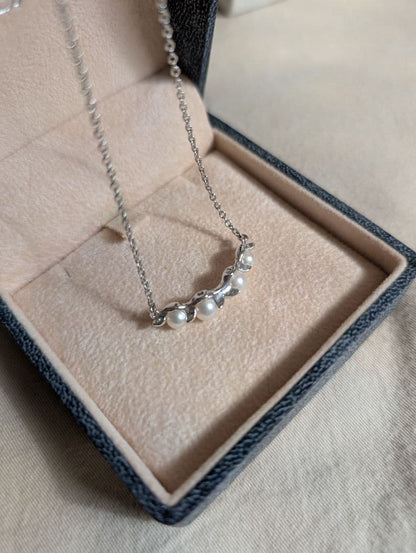 Tasaki Baby Pearl Silver Necklace with white baby pearls, adjustable 200mm length, displayed with certificate and box