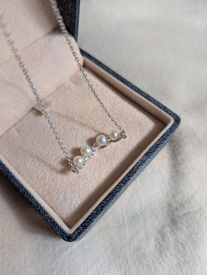 Tasaki Baby Pearl Silver Necklace with white baby pearls, adjustable 200mm length, displayed with certificate and box
