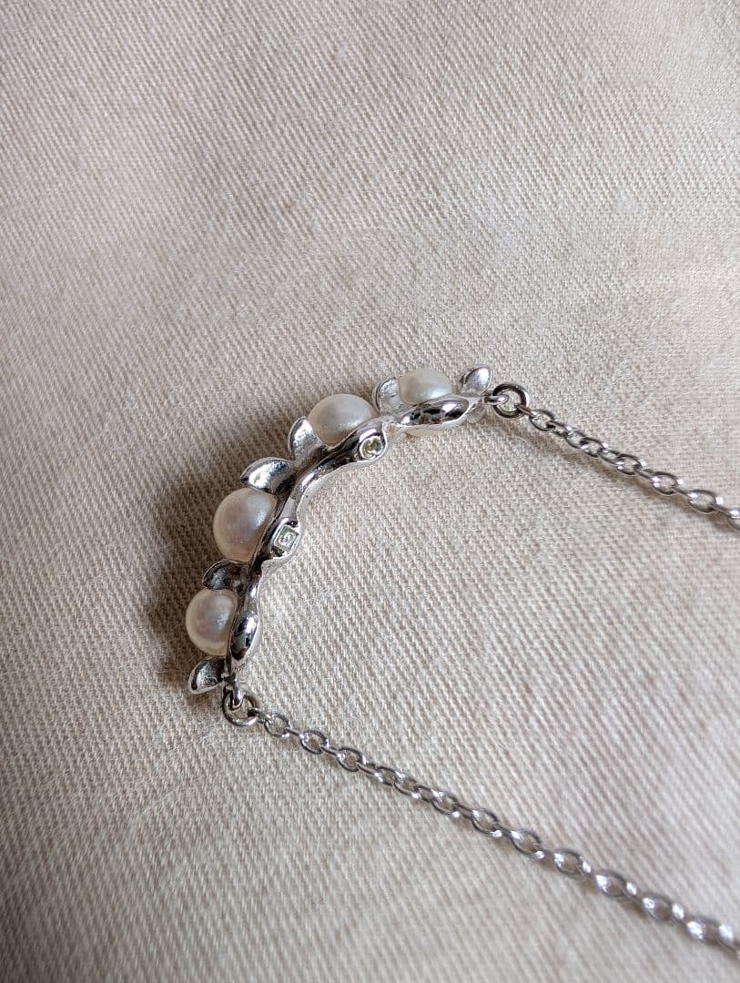 Tasaki Baby Pearl Silver Necklace with white baby pearls, adjustable 200mm length, displayed with certificate and box