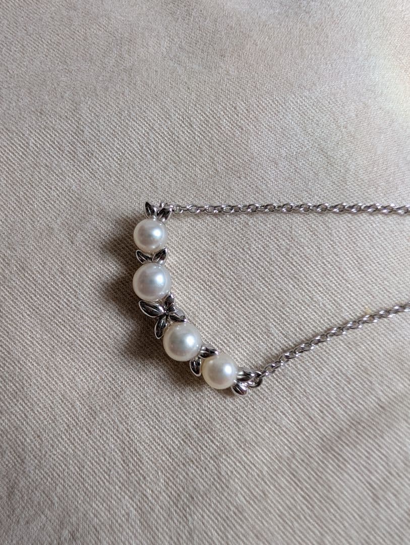 Tasaki Baby Pearl Silver Necklace with white baby pearls, adjustable 200mm length, displayed with certificate and box
