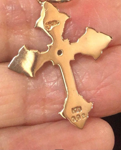 Agatte K10 gold pendant top with antique leaf motif cross and center diamond weighing 1.79 grams