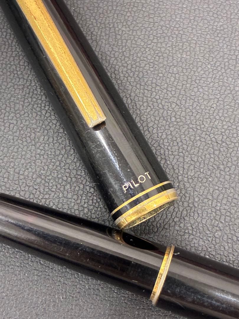 PILOT Fountain Pen in black color with extra fine nib positioned on white background