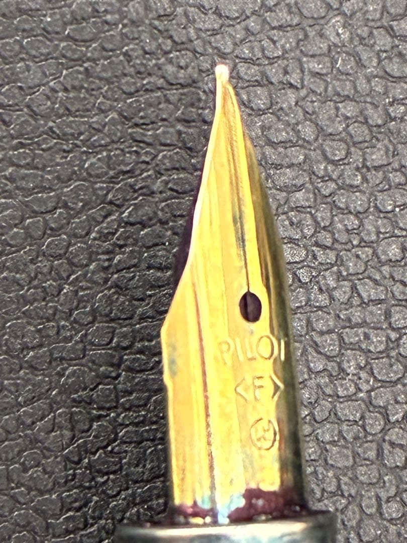 PILOT Fountain Pen in black color with extra fine nib positioned on white background