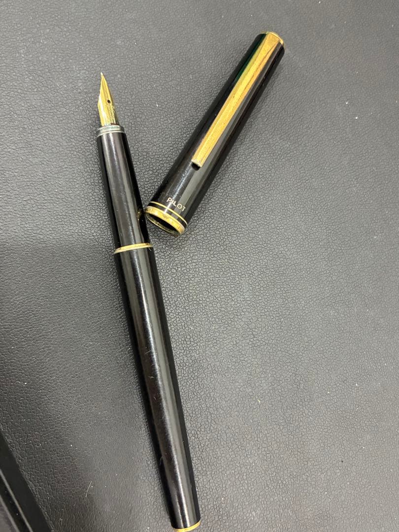 PILOT Fountain Pen in black color with extra fine nib positioned on white background