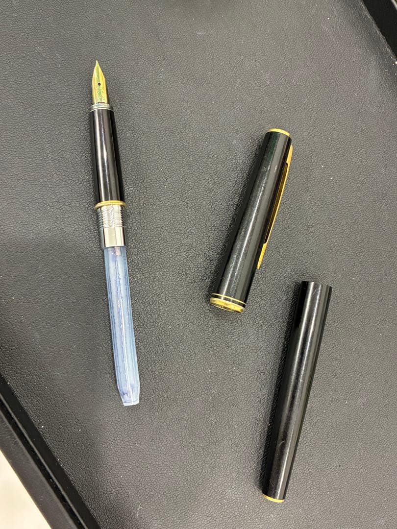 PILOT Fountain Pen in black color with extra fine nib positioned on white background