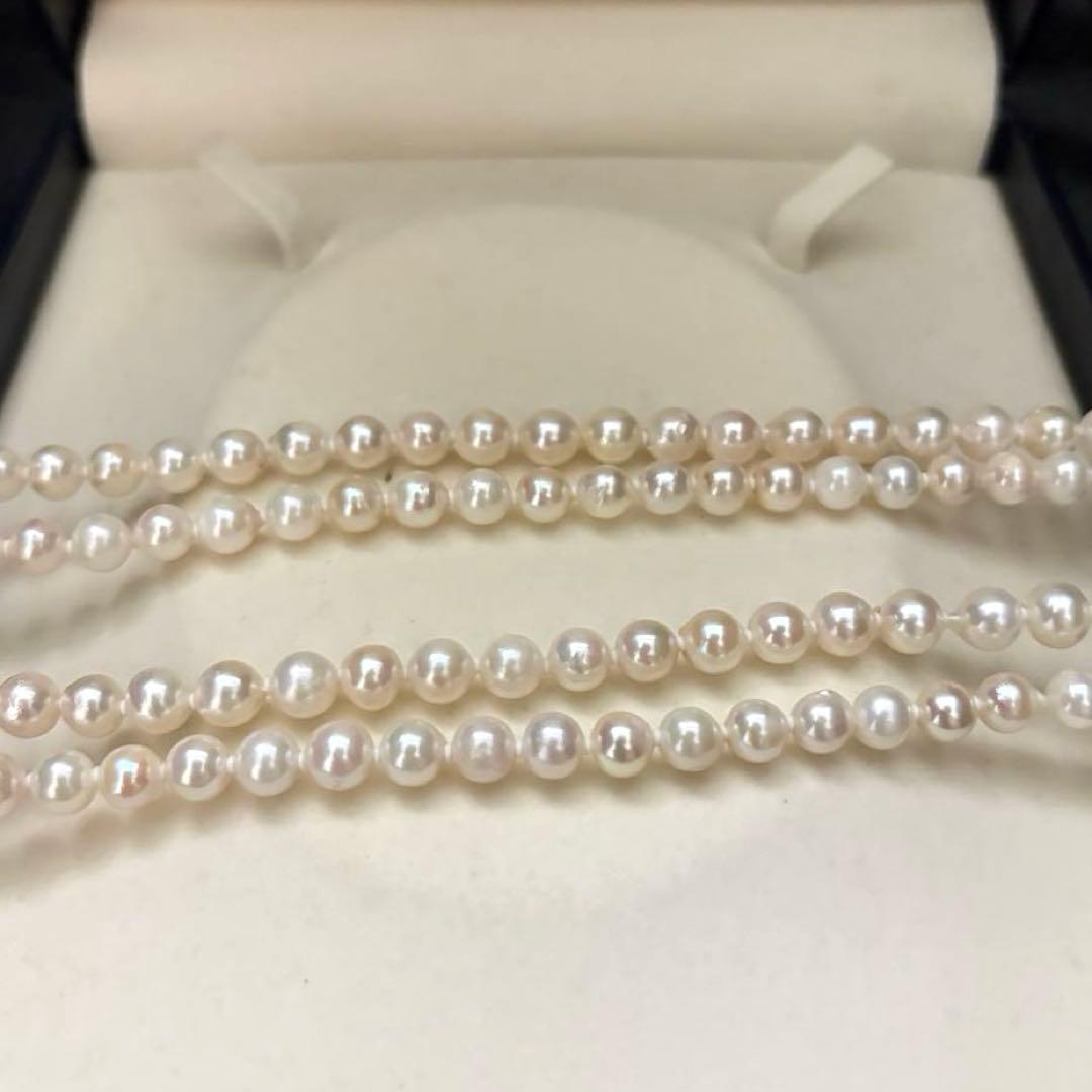 Long 121cm triple strand Akoya pearl necklace with 7.5mm pearls and silver clasp