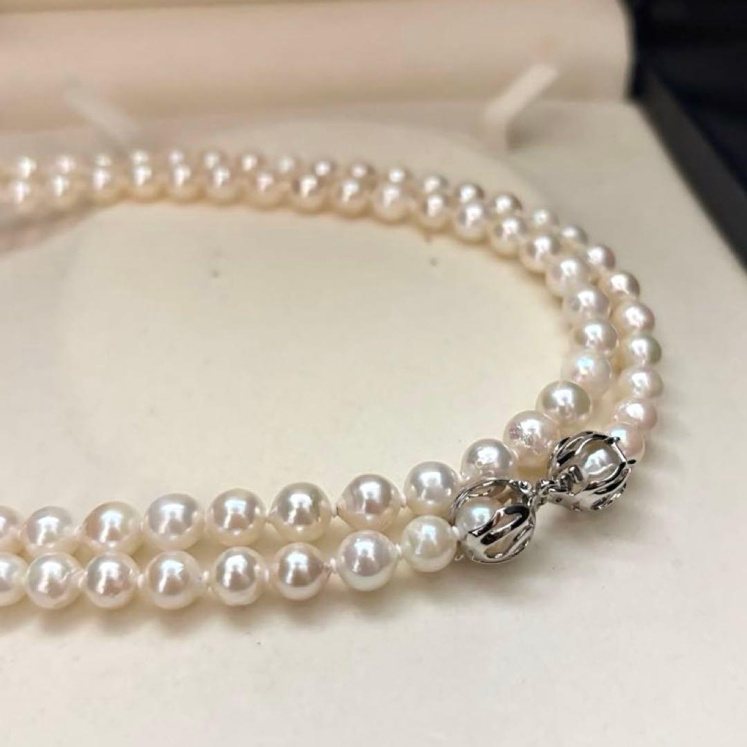 Long 121cm triple strand Akoya pearl necklace with 7.5mm pearls and silver clasp