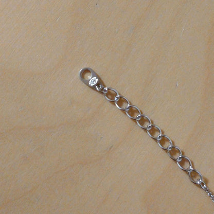 TASAKI silver pearl necklace with heart-shaped pendant measuring 1.7 x 1.3 cm