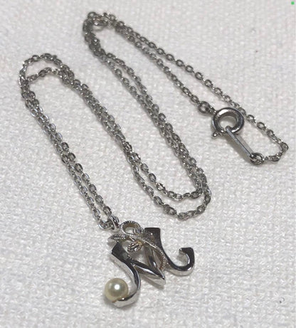 Mikimoto silver necklace with pearl pendant and engraved initial M on a 43 cm chain