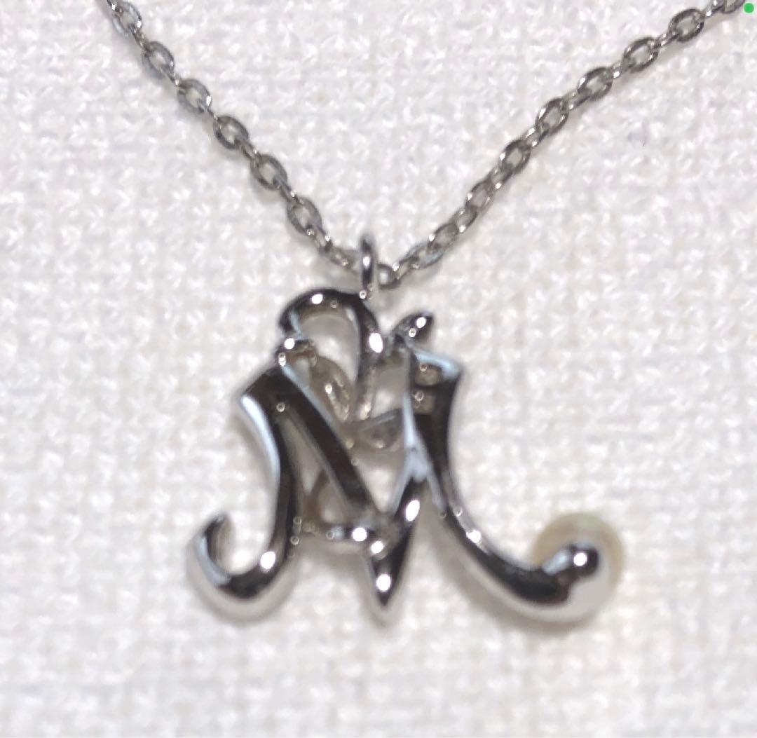 Mikimoto silver necklace with pearl pendant and engraved initial M on a 43 cm chain