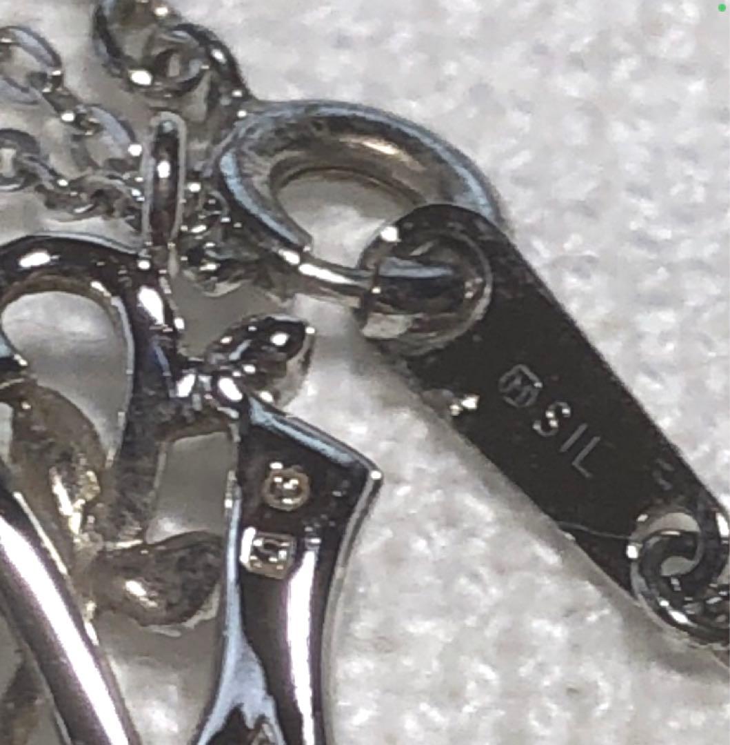 Mikimoto silver necklace with pearl pendant and engraved initial M on a 43 cm chain