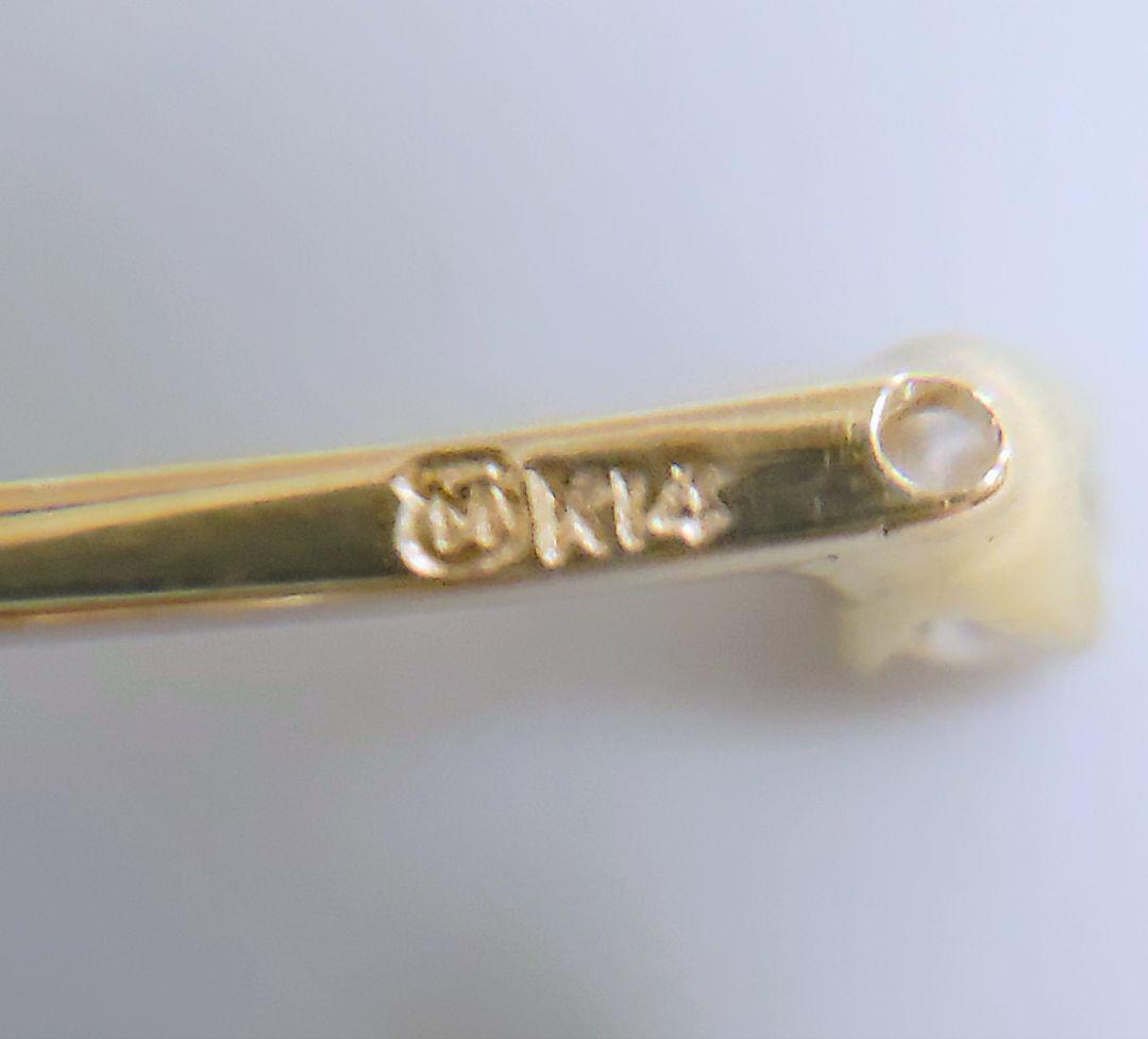 MIKIMOTO K14 yellow gold pendant top featuring 2 diamonds weighing 1.10 grams
