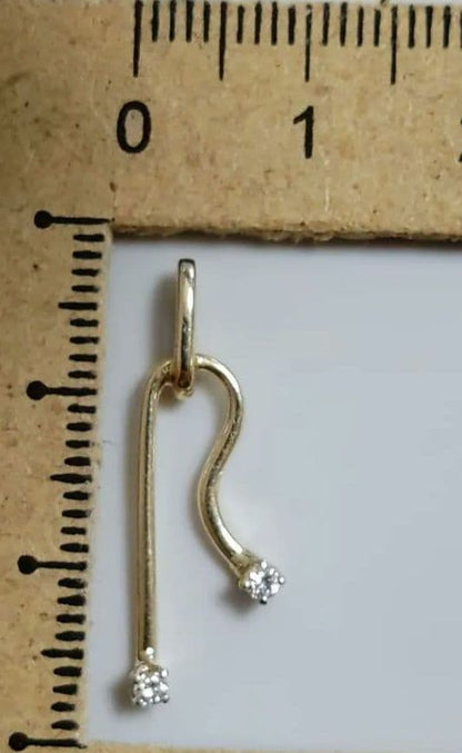 MIKIMOTO K14 yellow gold pendant top featuring 2 diamonds weighing 1.10 grams