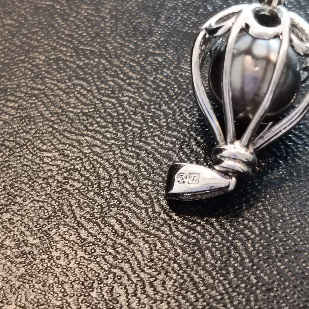 Tasaki Necklace Pendant featuring a black butterfly design in 925 silver