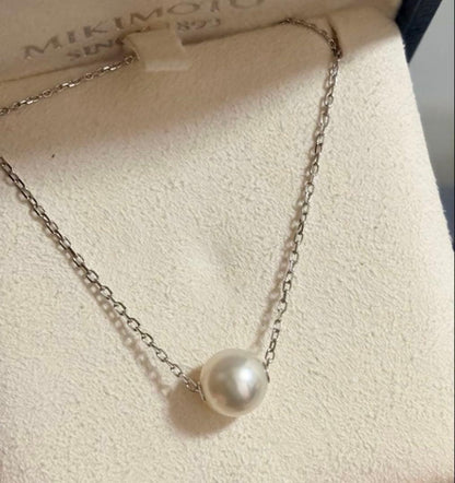 Mikimoto Pearl Necklace with one 8mm white pearl on a delicate chain