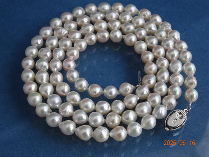 Akoya pearl necklace featuring 7-7.5mm pearls with an 83cm length displayed on a white background