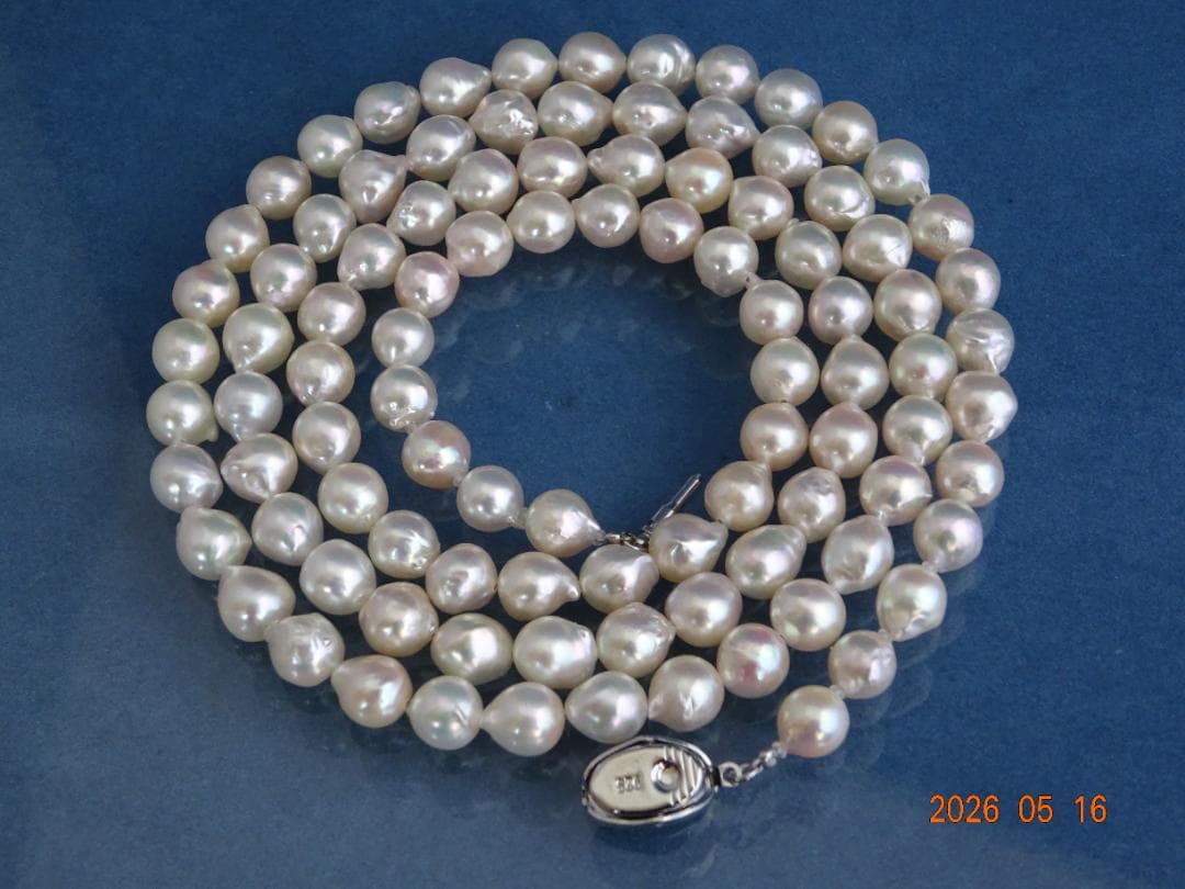 Akoya pearl necklace featuring 7-7.5mm pearls with an 83cm length displayed on a white background